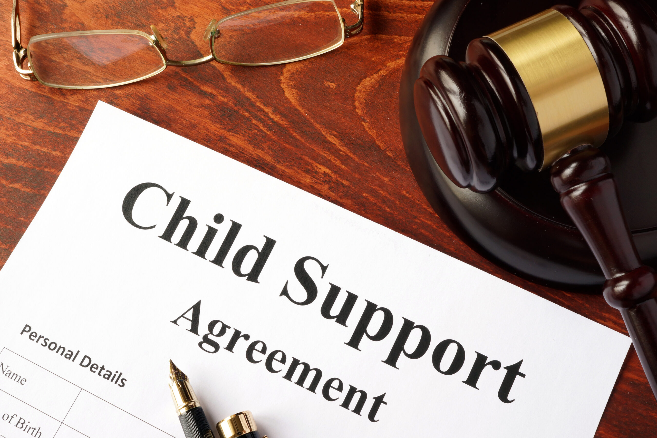 Child support agreement on an office table. clear explanations